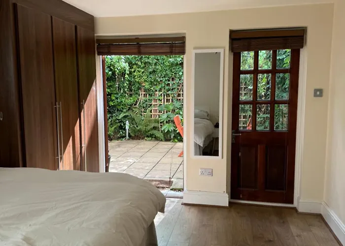 A Beautiful Room With A Private Garden